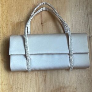 Satin Clutch with Rhinestone Handles.